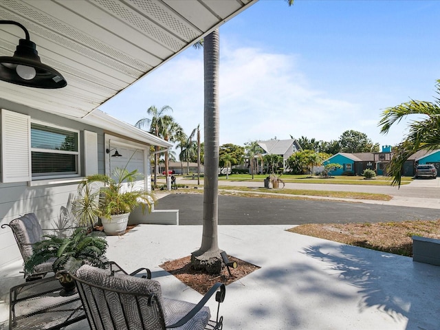 view of patio / terrace with a garage