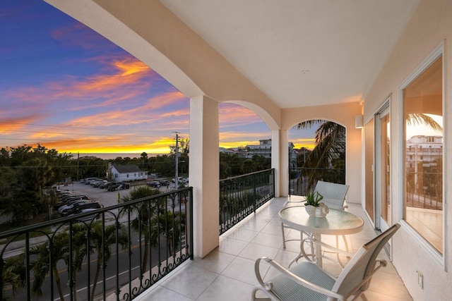 view of balcony at dusk