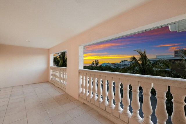 view of balcony at dusk