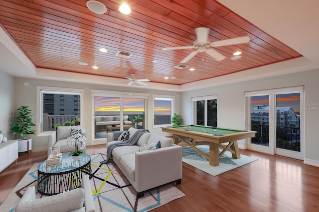 playroom featuring wood ceiling, hardwood / wood-style floors, pool table, and a tray ceiling