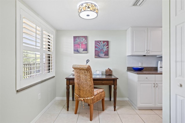 home office with light tile floors