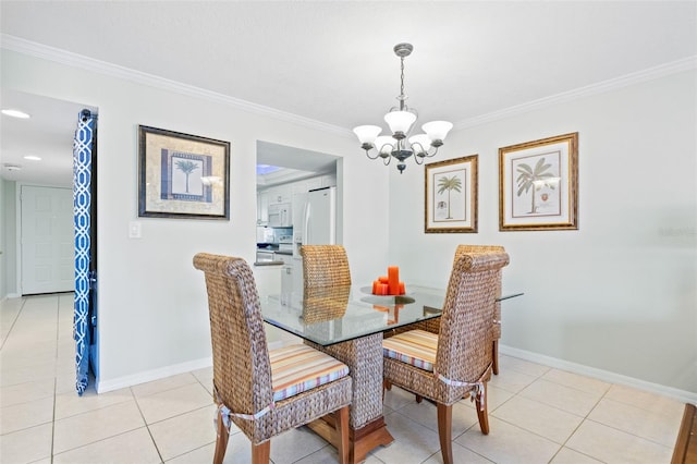 tiled dining area featuring a chandelier and crown molding