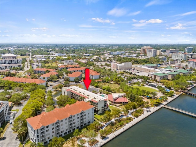 birds eye view of property featuring a water view