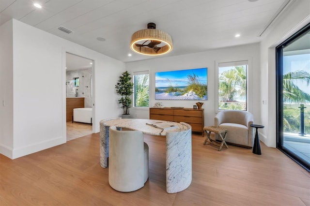 sitting room with light hardwood / wood-style flooring