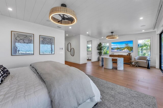 bedroom with hardwood / wood-style floors