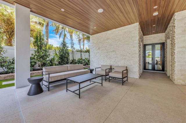 view of patio / terrace with an outdoor hangout area and french doors