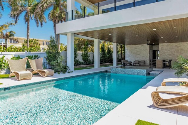 view of swimming pool featuring a patio