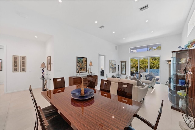 dining room featuring light tile floors