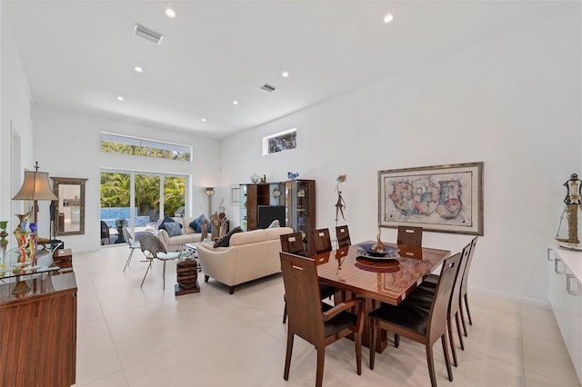 dining room with light tile floors