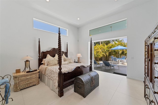 tiled bedroom featuring access to outside