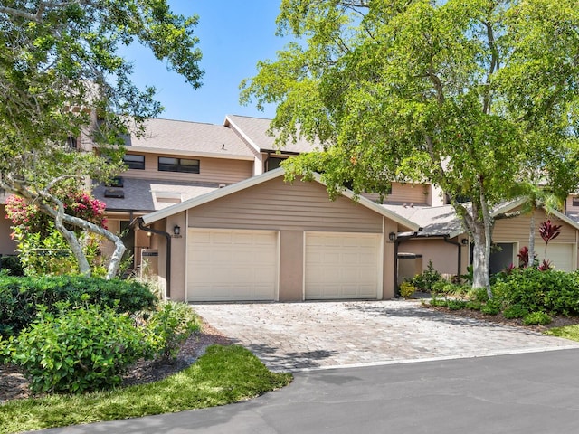 view of front of home with a garage