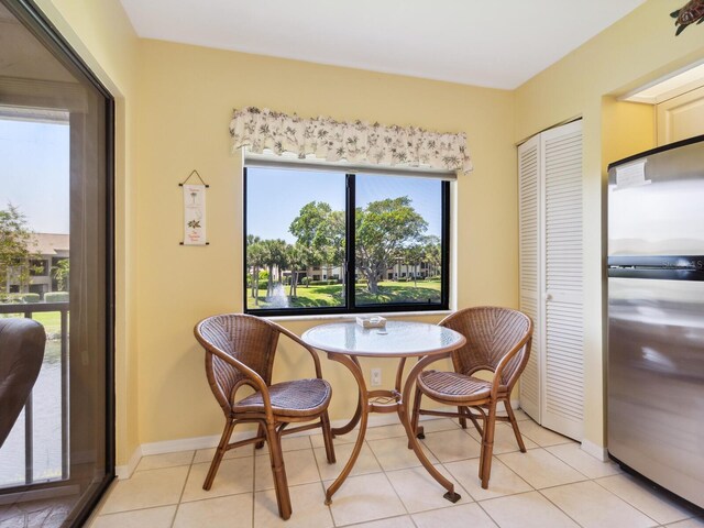 dining room with light tile floors