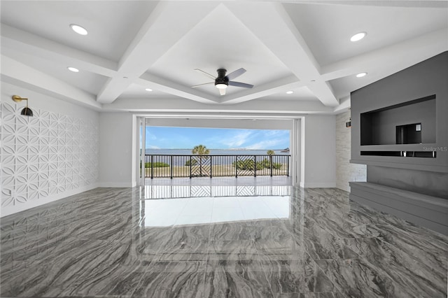 unfurnished living room with coffered ceiling, beamed ceiling, tile flooring, and ceiling fan