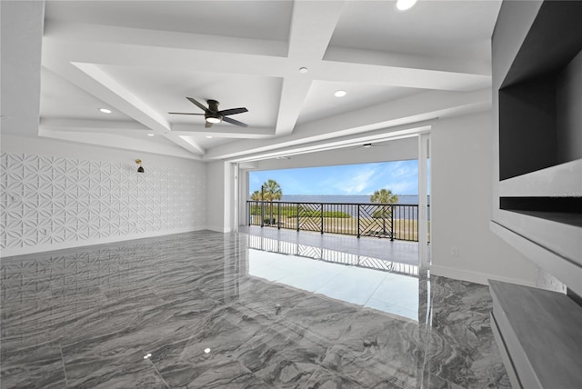 empty room featuring tile flooring, ceiling fan, beam ceiling, and coffered ceiling