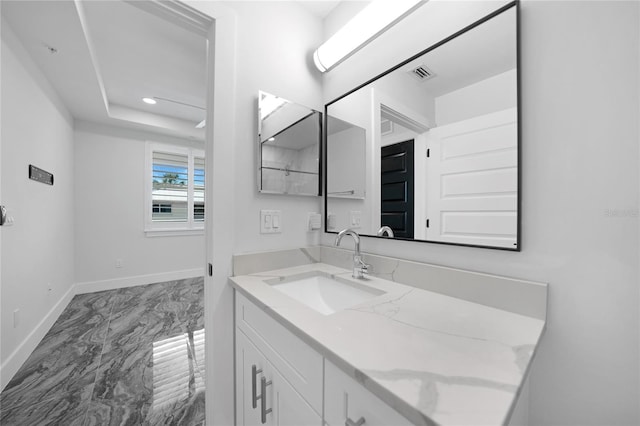 bathroom with oversized vanity and tile floors