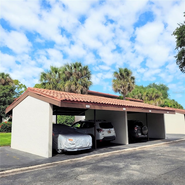 view of parking with a carport