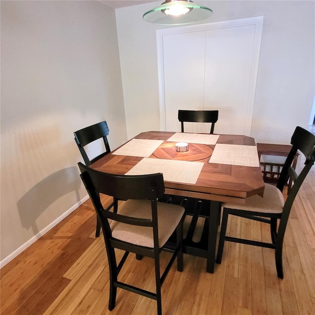 dining room featuring light wood-type flooring