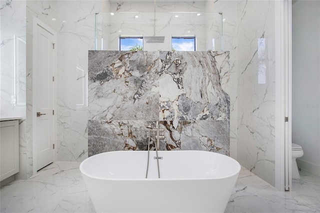 4111 Williams Rd, Estero, FL 33928 - bathroom featuring a marble finish shower, toilet, a soaking tub, marble finish floor, and stone wall