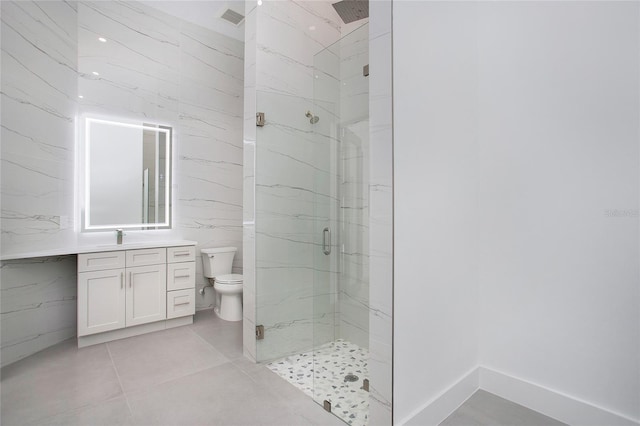 4111 Williams Rd, Estero, FL 33928 - full bathroom featuring a marble finish shower, visible vents, toilet, tile patterned floors, and vanity