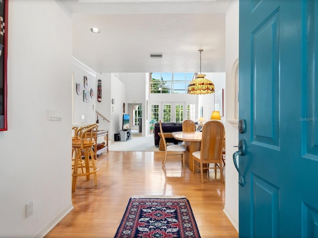 entrance foyer with light wood-type flooring