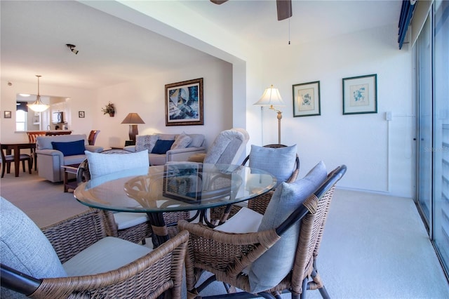 dining area with light carpet