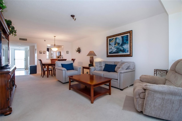 living room with light carpet