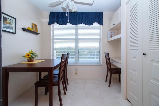 dining room featuring ceiling fan