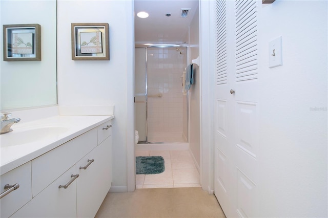 bathroom with walk in shower, tile patterned flooring, vanity, and toilet