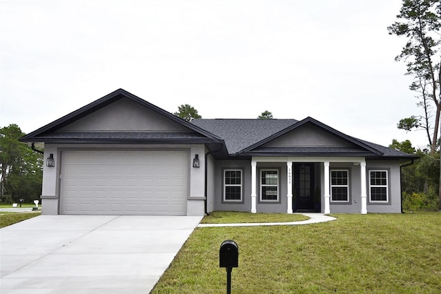 single story home with a front yard and a garage