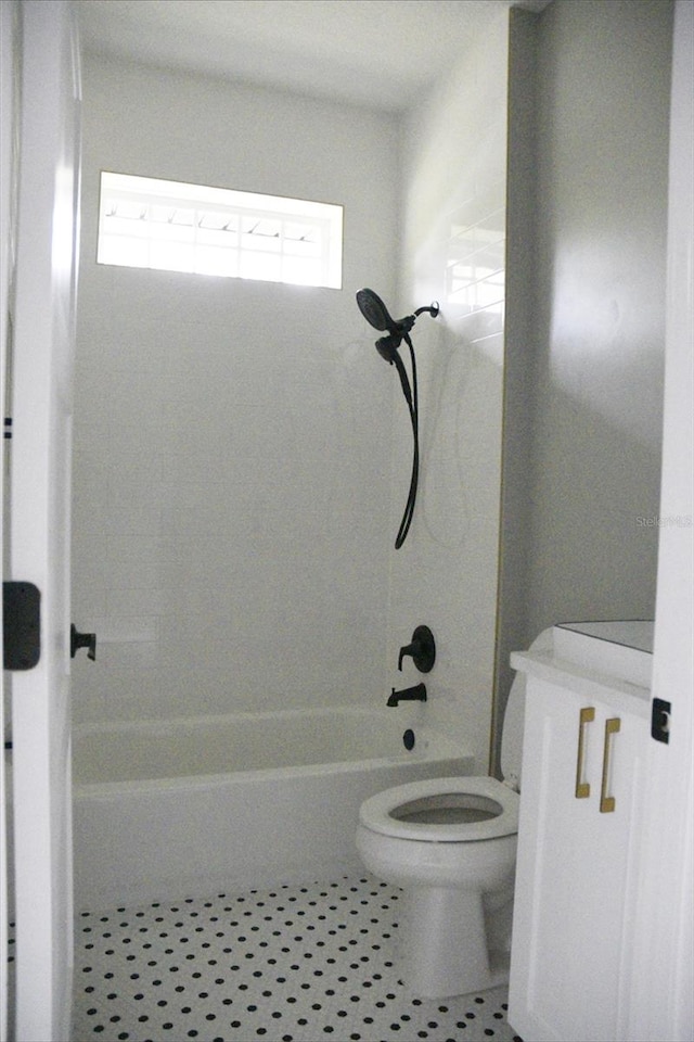 full bathroom with tile patterned flooring, vanity, toilet, and shower / tub combination