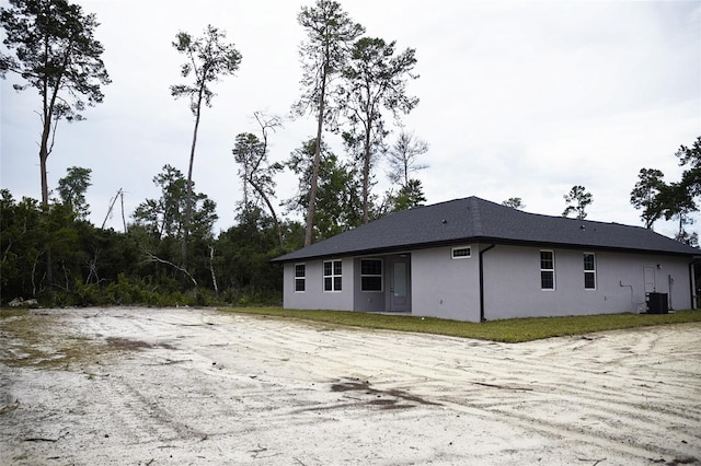 view of property exterior featuring central air condition unit