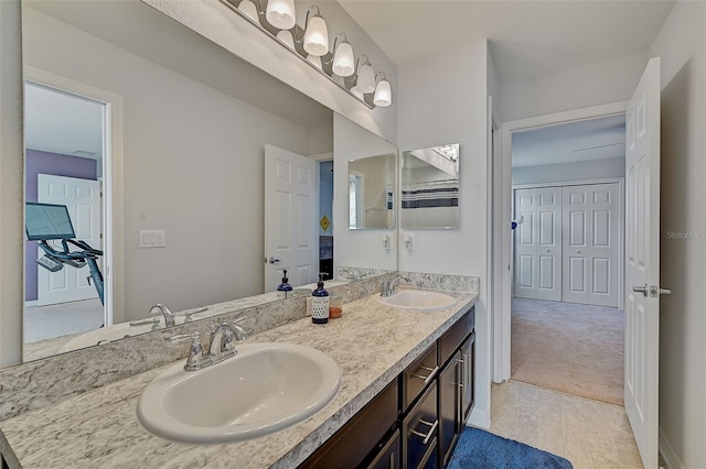 bathroom with tile flooring and dual bowl vanity