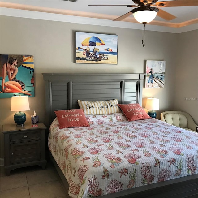 tiled bedroom with ceiling fan