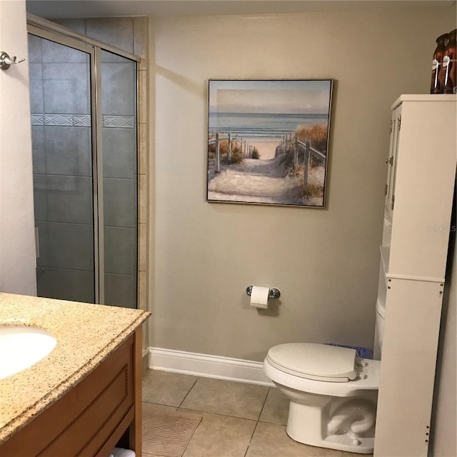 bathroom featuring a shower with shower door, toilet, tile floors, and vanity