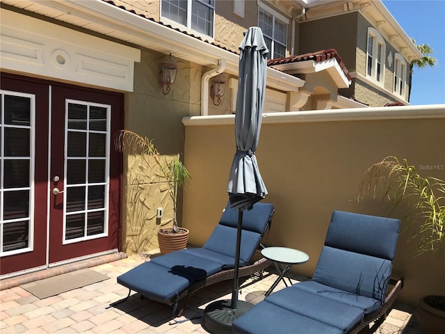 view of patio featuring french doors