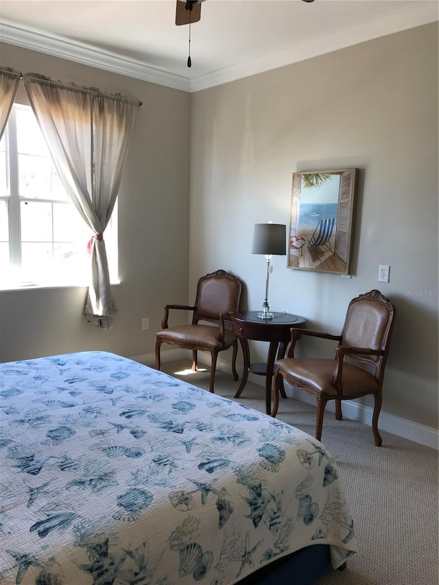 carpeted bedroom with ornamental molding