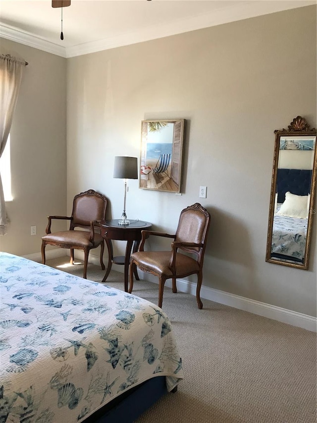 bedroom featuring crown molding and carpet flooring