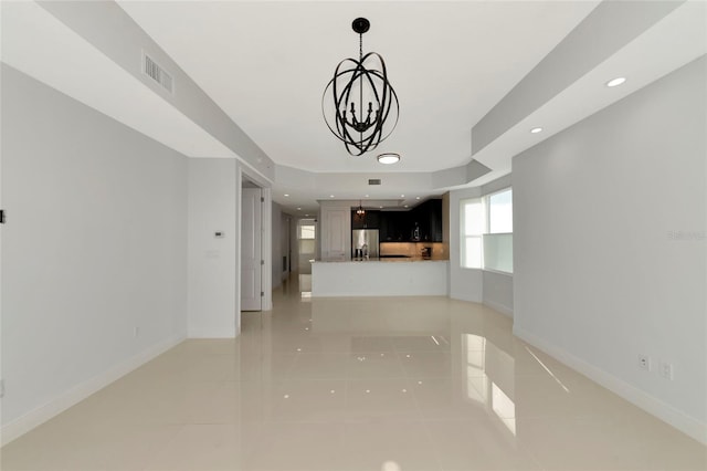 unfurnished living room with light tile patterned floors, recessed lighting, visible vents, and baseboards