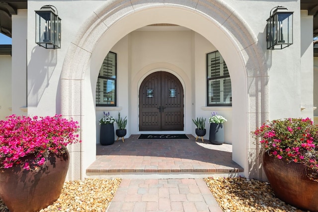 property entrance featuring french doors