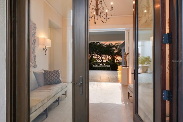 entryway featuring a chandelier