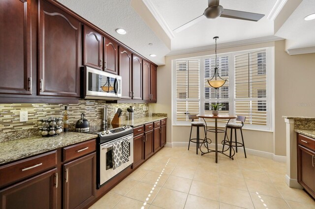 kitchen with ceiling fan, light tile floors, electric range oven, backsplash, and ornamental molding