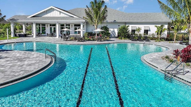 view of swimming pool with a patio