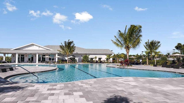 view of swimming pool with a patio area