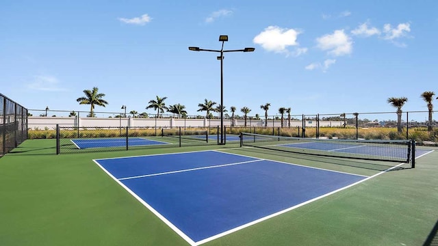 view of sport court featuring basketball hoop