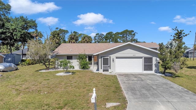 ranch-style house with a garage and a front lawn