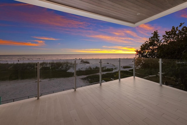 patio terrace at dusk with a water view