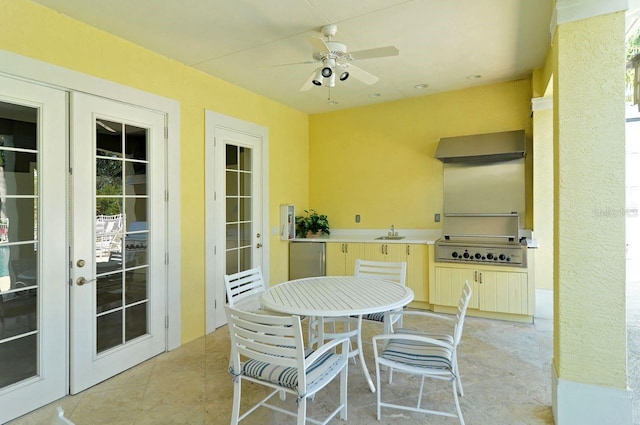 view of patio / terrace with ceiling fan, a grill, sink, and french doors