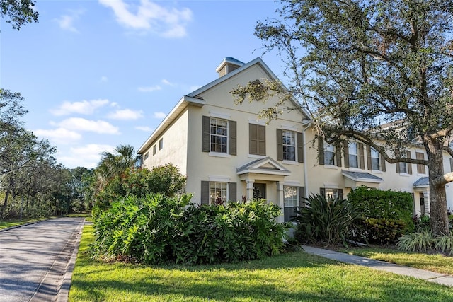 view of front of house with a front yard