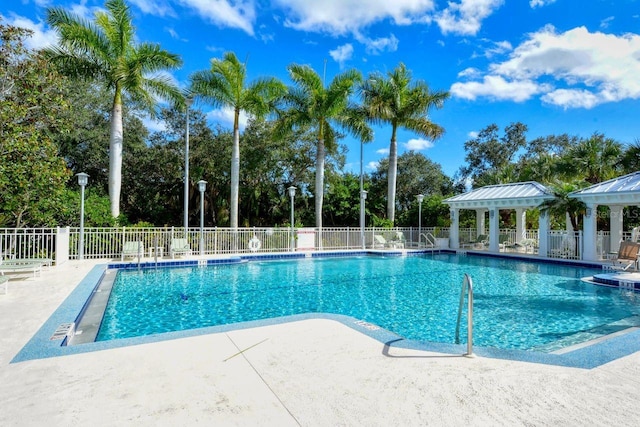 view of swimming pool featuring a patio area