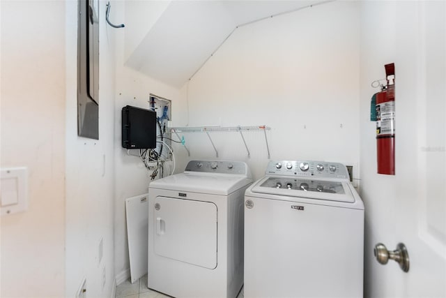 washroom with washer and dryer